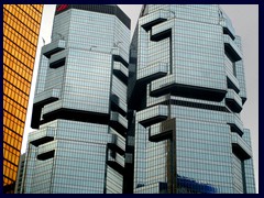 Lippo Towers from 1988. Originally built by an Australian, the glass towers are designed to resembles koalas climbing on the walls. The tallest tower is 186m tall.